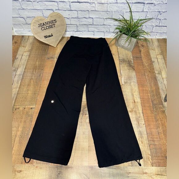 Lululemon Sit In Stillness Pant
Black wide leg drawstring bottom ankles size 10 - Picture 5 of 16